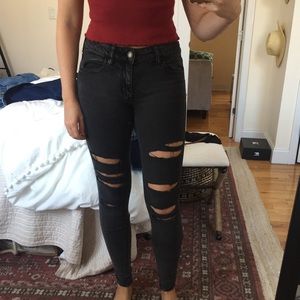 Super stretch black ripped jeans